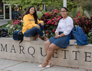 Two students sitting
