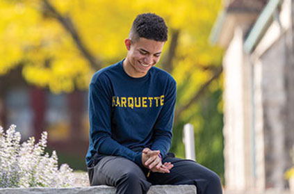A student smiling. Link to Donor-Advised Funds