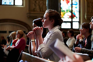 Photo of students in church. Link to Gifts of Appreciated Securities