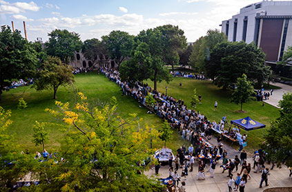 Aerial Photo of students on campus during festival. Link to Gifts That Protect Your Assets