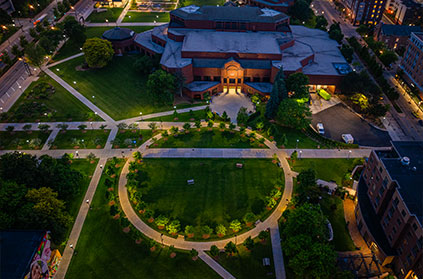 Aerial photo of campus at dusk. Link to Gifts That Pay You Income